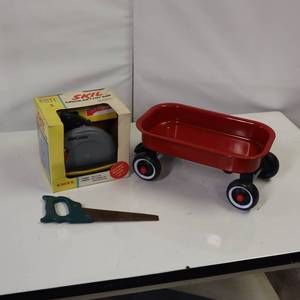 lot 66 image: Vintage in original box SKIL CIRCULAR SAW Kids toy, small wagon and saw