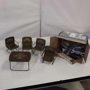 lot 68 image: VINTAGE TIN TOY TABLE AND CHAIRS _ vintage collapsible ruler and a bunch of light switches.