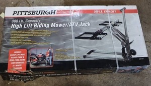 lot 122 image: NEW - unopened PITTSBURGH 300 lb. High-lift ATVRiding Lawn Mower Lift Jack