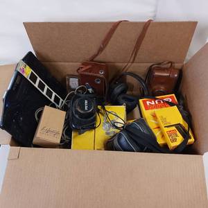 lot 103 image: Lot of Vintage Assortment of Cameras and related items