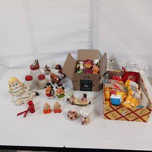 lot 135 image: Large Lot of Vintage Figurines and salt & pepper shakers in original packaging.