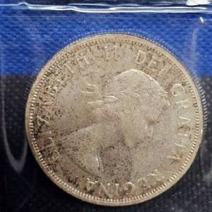 lot 13 image: 1963 Canada Silver Dollar(80%), Toned
