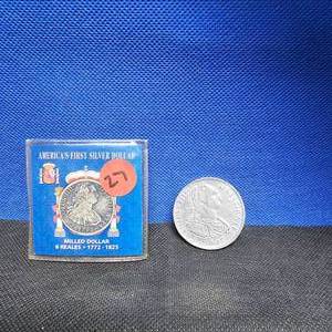 lot 27 image: Copy, Americas First Silver Dollar