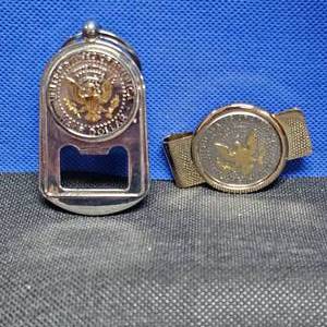 lot 29 image: Kennedy Half Dollar Money Clip and Bottle Opener