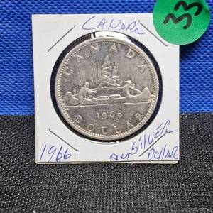 lot 33 image: 1966 AU Canada Silver Dollar