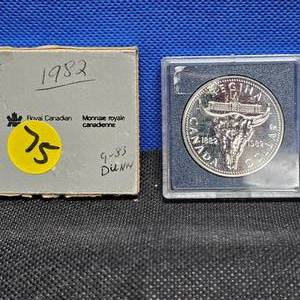lot 75 image: 1982 Canada Centennial Dollar (ReginaCowskull)
