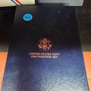 lot 103 image: 1994 US Mint Prestige Set($ Coin is Silver)