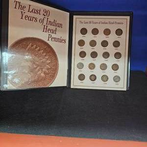 lot 132 image: (20) Indian Head Cents with Book