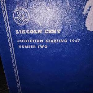 lot 135 image: (2) Lincoln Penny Books wBicentennial Ike