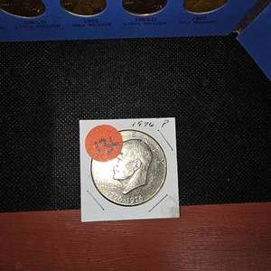 lot 136 image: (2) Lincoln Penny Books wBicentennial Ike