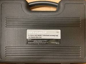 lot 43 image: Mixpower 16-Piece SAE Metric Universal Locking Lug Nut Master Key Set