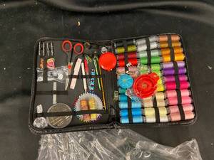 lot 44 image: Comprehensive Sewing Kit with Threads, Scissors, and Accessories