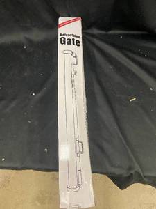 lot 57 image: Retractable Safety Gate with Easy Installation