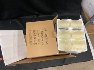 lot 112 image: Set of 12 Flameless LED Ivory Candles with Remote and Timer
