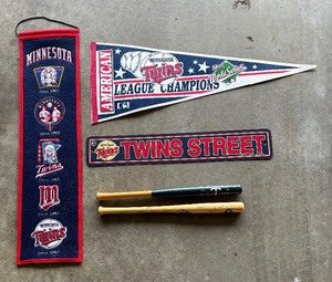 lot 137 image: Minnesota Twins Baseball Pennants, Sign and Miniature Bats