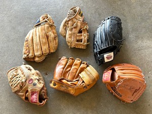 lot 179 image: Baseball Gloves by Rawlings, Wilson, Spalding and More