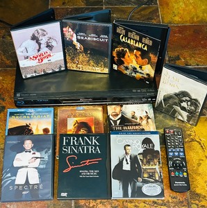 lot 236 image: Panasonic DMP-BD60 Blu-Ray Disc Player with Remote and Variety of Movies