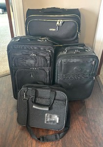 lot 196A image: Luggage  Suitcases by Travel Pro, Steve Madden and Lewis & Hyde