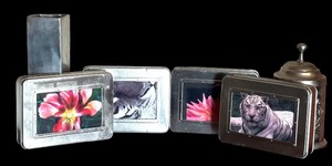 lot 154 image: Silver Decor and Four Tins with Vintage Cards