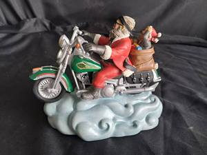 lot 6 image: Harley Davidson Santas Sled Figurine Collection