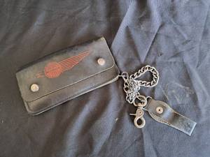 lot 53 image: Harley Davidson Lot (Leather Wallet, Cell Phone Holder, Patches, & Cup Cake Wraps)