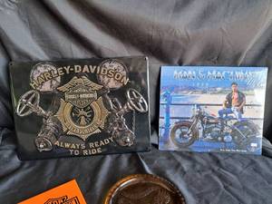 lot 60 image: Harley Davidson Lot (Tin Sign, Glass Plates, 1999 Calendar, 2 Books)