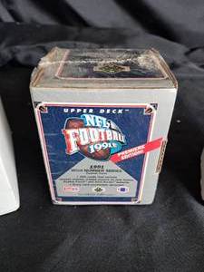 lot 100 image: Sports Card Collection -- Upper Deck 1991 Football Premier Edition, 100 Assorted Baseball Cards, Box Full of Random Baseball Cards