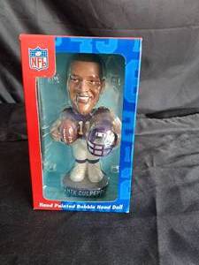 lot 116 image: Daunte Culpepper hand painted bobble head doll NIB