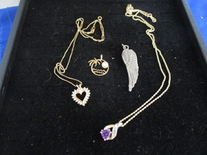 lot 107 image: Pendants with 10K
