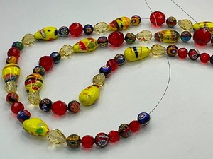 lot 6 image: Venetian Murano Millefiori with Yellow Art Glass Bead Strand
