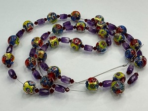 lot 10 image: Venetian Murano Millefiori Over Foil Lampwork with Amethyst Glass Bead Strand
