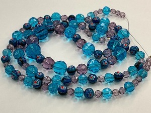 lot 18 image: Murano Millefiori and Blue Crystal Glass Bead Strand