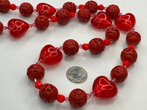 lot 25 image: Chinese Cinnabar with Glass Heart Bead Strand
