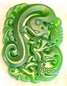 lot 15 image: Intricate Green Jade Medallion with Dragon Design