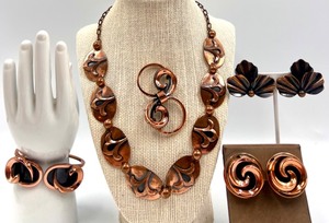 lot 27 image: Copper Jewelry Set with Necklace, Brooch, Cuff, and Earrings