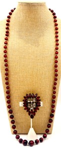 lot 44 image: Vintage Red Bead Necklace with Antique Rhinestone Fur Brooch