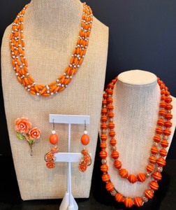 lot 97 image: Vintage Hong Kong Orange Beaded Necklace, Earrings, and Brooch Set