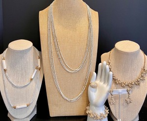 lot 122 image: Vintage Gold Toned and Metal Coral Style Jewelry Set Featuring 3 Necklaces, Earrings, Bracelet, and Ring