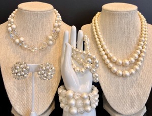 lot 142 image: Vintage Pearl and Crystal Jewelry Set including 2 Necklaces, 2 Bracelets and a Pair of Clip-on Earrings. Featuring Coro Brand Bracelet