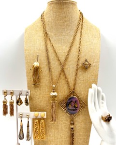 lot 161 image: Vintage Gold-Tone Monet Necklace and Clip-On Earring Set with Tassel Detail and Cameo Style Necklace, Earrings and Brooch