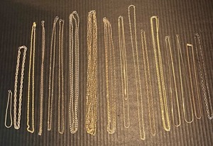 lot 169 image: Collection of 16 Gold Tone Necklaces & 1 Bracelet Featuring NY Celebrity Brand