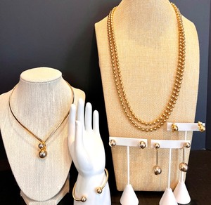lot 172 image: Stunning Gold Tone Jewelry Set with 2 Necklaces, 3 Pairs of Earrings, and Bracelet Featuring Burger & Coro Brands