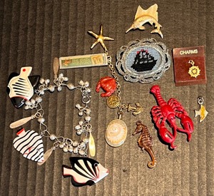 lot 175 image: Collection of Nautical Themed Jewelry and Charms