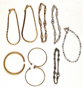 lot 180 image: Collection of 9 Elegant Womens Bracelets in Various Designs including Two 14K GP Chains