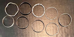 lot 196 image: Set of 9 Metallic Bangles with Various Designs