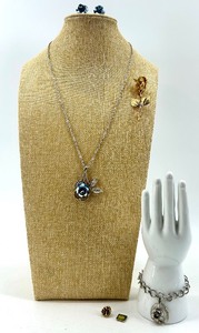 lot 207 image: Floral Jewelry Set with Necklace, Earrings, and Gold Brooch Including Giovanni