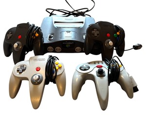 lot 38 image: Vintage Nintendo 64 Control Deck including Controllers