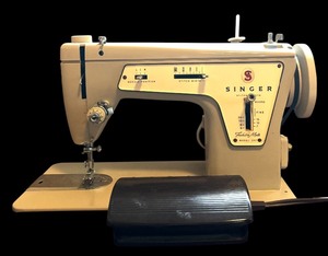 lot 31 image: Sewing Table and Sewing Machine Fashion Mate by Singer