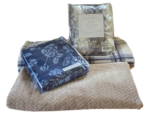 lot 144 image: Selection of Four Cozy Throws