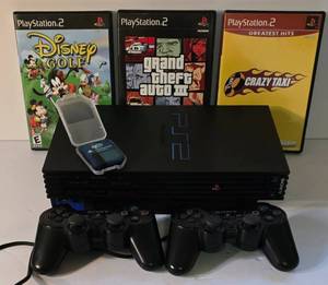 lot 167 image: Sony PlayStation 2 Console, Controllers & Multiple Games